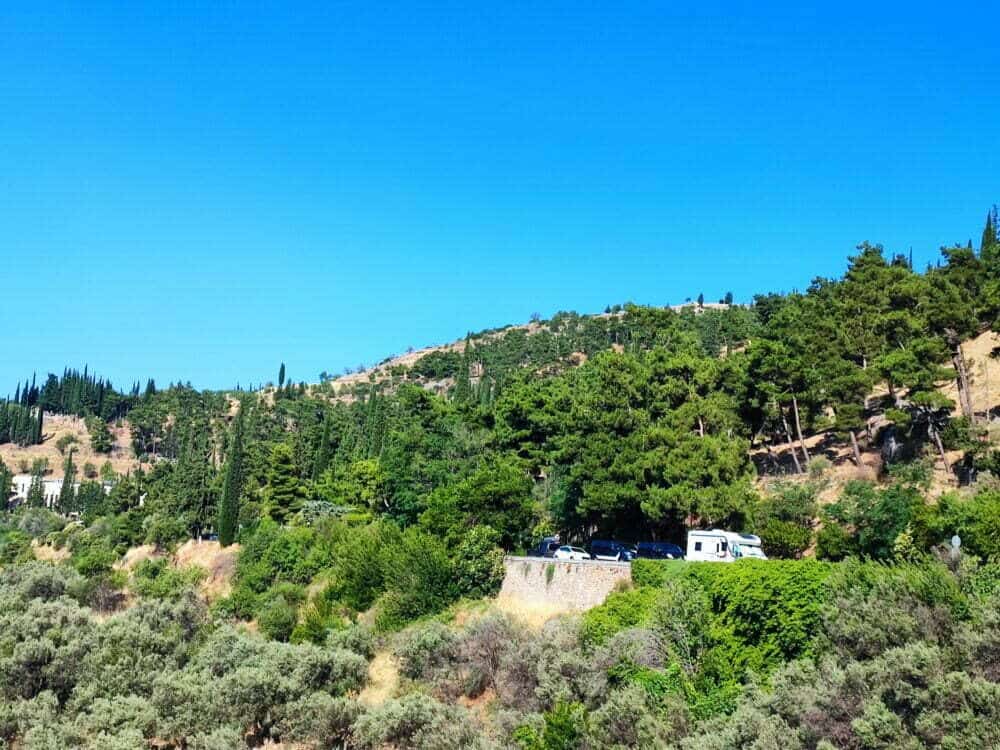 Our motorhome at the foot of ancient Delphi and Mount Parnassus